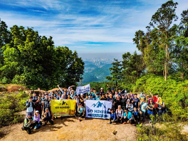 Suunto Malaysia flag on summit